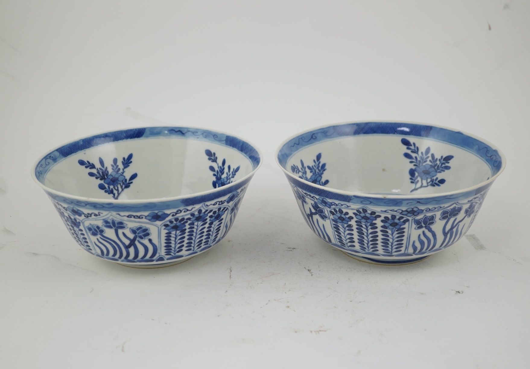 A pair of Chinese blue and white bowls, Kangxi four character mark, 19th century